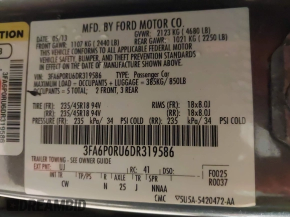 2013 Ford Fusion Titanium Hybrid with VIN 3FA6P0RU6DR319586, listed as a IAAI auction lot 42138979 with 125,388 mi miles. Bid and sale history available at carsss.com. Image 9.