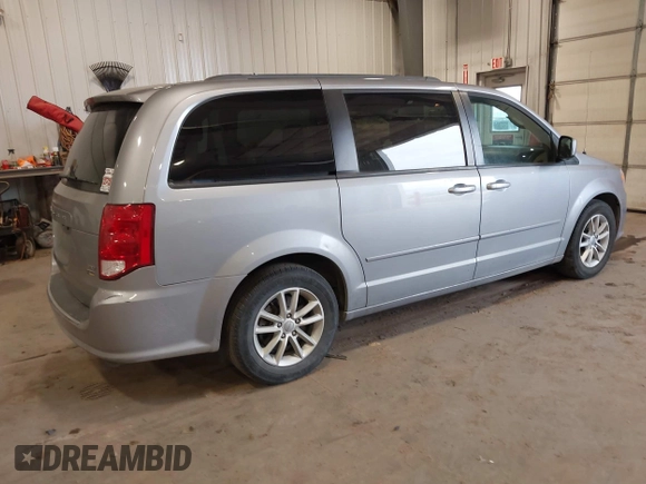 2014 Dodge Grand Caravan SXT with VIN 2C4RDGCG9ER213426, listed as a IAAI auction lot 41044553 with 175,140 mi miles and . Bid and sale history available at DreamBid. Image 4.