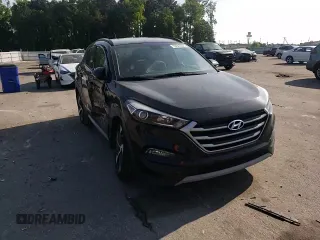 2017 Hyundai Tucson Sport z VIN KM8J33A21HU550398, wystawiony jako Copart lot #55043145 z przebiegiem 92 677 mil mil oraz Szkoda całkowita • Salvage title. Historia ofert i sprzedaży dostępna na DreamBid. Obrazek 14.