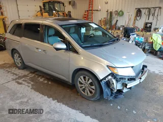 2015 Honda Odyssey EX-L with VIN 5FNRL5H6XFB063430, listed as a IAAI auction lot 41913142 with 238,051 mi miles and . Bid and sale history available at carsss.com. Image 1.