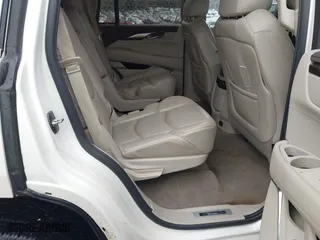 2015 Cadillac Escalade Premium with VIN 1GYS4NKJ9FR547587, listed as a IAAI auction lot 41556378 with 155,038 mi miles. Bid and sale history available at carsss.com. Image 8.