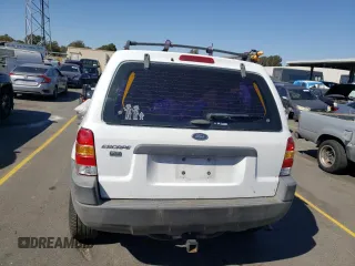 2004 Ford Escape XLS with VIN 1FMYU02184DA20455, listed as a Copart auction lot 73806544 with 322,565 mi miles and Clean Title. Bid and sale history available at DreamBid. Image 6.