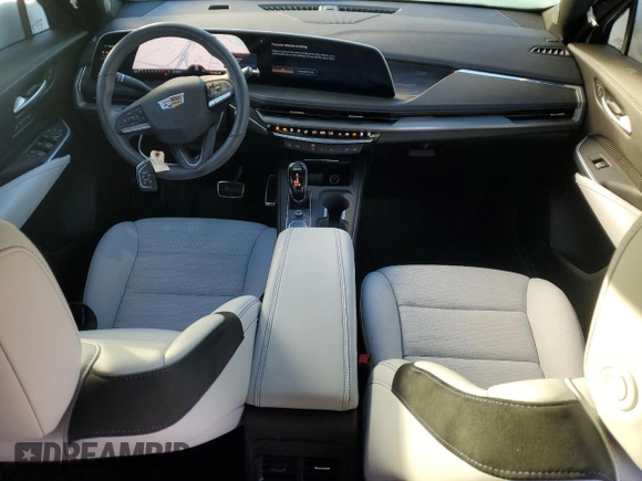 2024 Cadillac XT4 FWD Sport with VIN 1GYFZER47RF101186, listed as a Copart auction lot 79128454 with 10,499 mi miles and Salvage title. Bid and sale history available at DreamBid. Image 8.