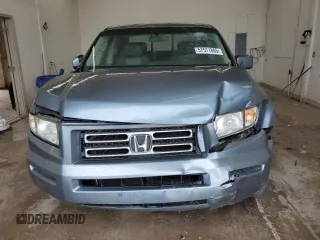 2007 Honda Ridgeline RTS z VIN 2HJYK16467H514031, wystawiony jako Copart lot #57571865 z przebiegiem 298 895 mil mil oraz Szkoda całkowita • Salvage title. Historia ofert i sprzedaży dostępna na DreamBid. Obrazek 5.