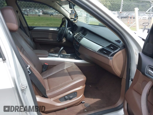 2011 BMW X5 50i with VIN 5UXZV8C55BL419654, listed as a IAAI auction lot 42752609 with 204,677 mi miles and . Bid and sale history available at DreamBid. Image 5.