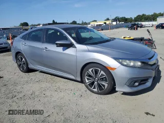 2016 Honda Civic EX-L z VIN 19XFC1F72GE219894, wystawiony jako Copart lot #58762635 z przebiegiem 104 554 mil mil oraz Szkoda całkowita • Salvage title. Historia ofert i sprzedaży dostępna na DreamBid. Obrazek 4.
