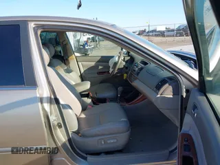 2004 Toyota Camry LE with VIN JTDBF32K140154908, listed as a IAAI auction lot 41773923 with 133,028 mi miles. Bid and sale history available at carsss.com. Image 5.