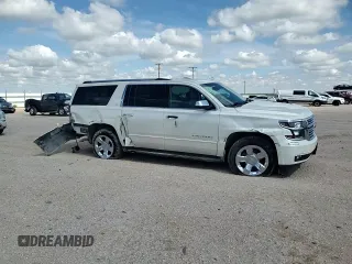 2015 Chevrolet Suburban LTZ with VIN 1GNSCKKC6FR705660, listed as a Copart auction lot 60328685 with 174,247 mi miles and Salvage title. Bid and sale history available at DreamBid. Image 14.