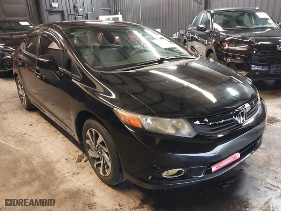 2012 Honda Civic Sdn LX with VIN 2HGFB2F56CH583324, listed as a IAAI auction lot 41899338 with 121,743 mi miles. Bid and sale history available at carsss.com. Image 1.