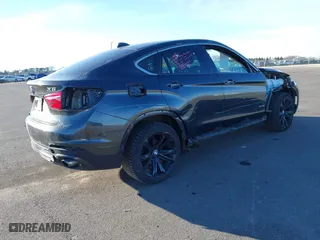 2015 BMW X6 xDrive35i with VIN 5UXKU2C50F0N77926, listed as a IAAI auction lot 41681268 with 136,118 mi miles. Bid and sale history available at carsss.com. Image 4.