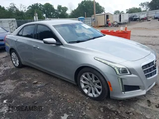 2014 Cadillac CTS Luxury RWD z VIN 1G6AR5S38E0173628, wystawiony jako IAAI lot #42343647 z przebiegiem 166 035 mil mil oraz . Historia ofert i sprzedaży dostępna na DreamBid. Obrazek 1.