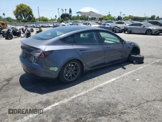 2023 Tesla Model 3 с VIN 5YJ3E1EAXPF586739, выставлен на аукционе Copart как лот 62958685 с пробегом 32 650 миль миль и Списание • Salvage title. История ставок и продаж доступна на DreamBid. Изображение 3.