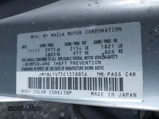 2012 Mazda 3 i Touring with VIN JM1BL1V75C1558856, listed as a IAAI auction lot 41224713 with 159,782 mi miles and . Bid and sale history available at DreamBid. Image 9.