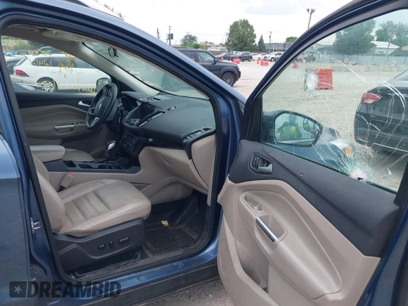 2018 Ford Escape Titanium z VIN 1FMCU0J91JUC00941, wystawiony jako IAAI lot #42679897 z przebiegiem 110 884 mil mil oraz . Historia ofert i sprzedaży dostępna na DreamBid. Obrazek 5.