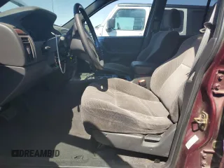 2000 Jeep Grand Cherokee Laredo with VIN 1J4G248S1YC407769, listed as a Copart auction lot 61653545 with 188,882 mi miles and Salvage title. Bid and sale history available at DreamBid. Image 7.