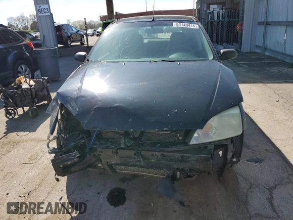 2007 Ford Focus S z VIN 1FAHP37N07W161088, wystawiony jako Copart lot #54140415 z przebiegiem 241 367 mil mil oraz Szkoda całkowita • Salvage title. Historia ofert i sprzedaży dostępna na DreamBid. Obrazek 5.
