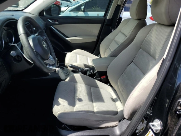 2014 Mazda CX-5 Touring z VIN JM3KE2CY8E0326988, wystawiony jako Copart lot #60473715 z przebiegiem 231 055 mil mil oraz Czysty tytuł • Clean title. Historia ofert i sprzedaży dostępna na DreamBid. Obrazek 7.