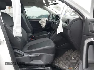 2023 Volkswagen Tiguan SE with VIN 3VVNB7AX8PM099759, listed as a IAAI auction lot 41340885 with 28,562 mi miles and . Bid and sale history available at DreamBid. Image 5.