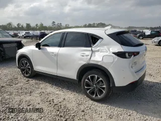 2023 Mazda CX-5 2.5 S Premium Package with VIN JM3KFBDM4P0131143, listed as a Copart auction lot 51627675 with 24,971 mi miles and Salvage Title. Bid and sale history available at carsss.com. Image 2.