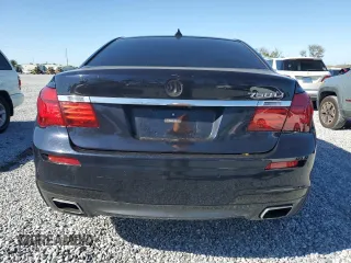 2015 BMW 7 Series 750Li with VIN WBAYE8C51FD781006, listed as a Copart auction lot 48202715 with 50,601 mi miles and Salvage Title. Bid and sale history available at carsss.com. Image 6.