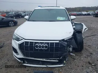 2020 Audi Q3 Premium with VIN WA1AECF35L1030273, listed as a IAAI auction lot 42006553 with 81,944 mi miles. Bid and sale history available at carsss.com. Image 12.