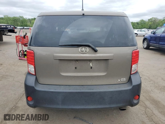 2012 Scion xB z VIN JTLZE4FE1CJ014494, wystawiony jako Copart lot #57779675 z przebiegiem 151 857 mil mil oraz Szkody całkowita. Historia ofert i sprzedaży dostępna na DreamBid. Obrazek 6.