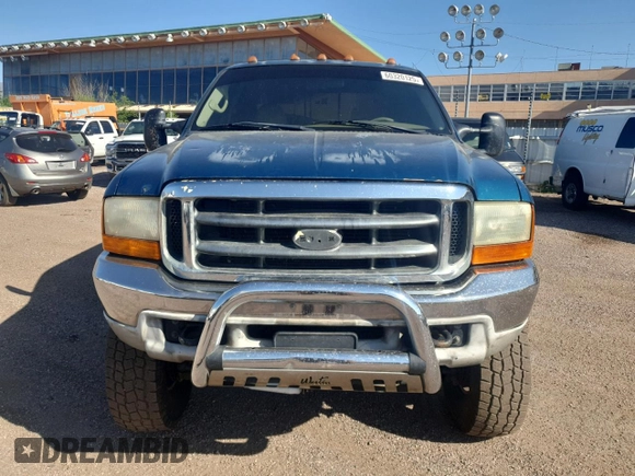 2000 Ford F-350 XL z VIN 1FTWW33F1YED10988, wystawiony jako Copart lot #60320125 z przebiegiem 185 381 mil mil oraz Czysty tytuł • Clean title. Historia ofert i sprzedaży dostępna na DreamBid. Obrazek 5.