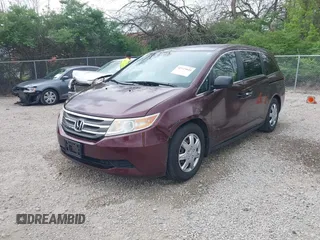 2013 Honda Odyssey LX with VIN 5FNRL5H25DB080209, listed as a IAAI auction lot 42123644 with 157,631 mi miles and . Bid and sale history available at carsss.com. Image 2.