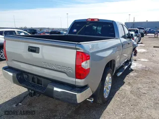 2018 Toyota Tundra 2WD SR with VIN 5TFRM5F11JX131505, listed as a IAAI auction lot 41244160 with 73,799 mi miles. Bid and sale history available at carsss.com. Image 4.