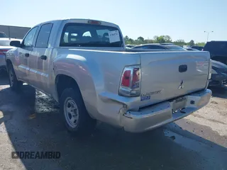 2007 Mitsubishi Raider LS with VIN 1Z7HC28K57S161586, listed as a IAAI auction lot 41864742 with 212,817 mi miles. Bid and sale history available at carsss.com. Image 3.