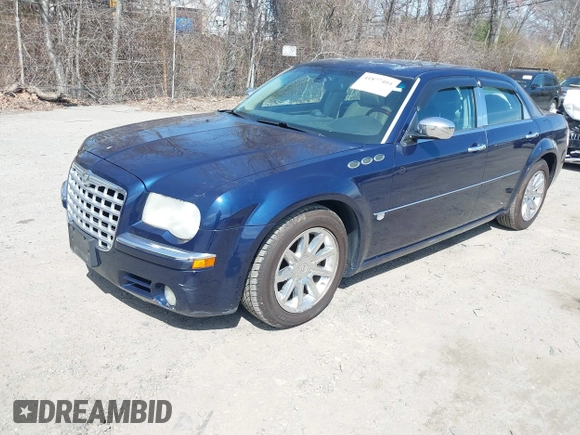 2005 Chrysler 300 C with VIN 2C3JA63HX5H124452, listed as a IAAI auction lot 41877404 with 93,972 mi miles and . Bid and sale history available at DreamBid. Image 2.