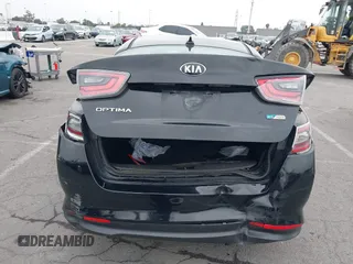 2015 Kia Optima with VIN KNAGM4AD8F5083391, listed as a IAAI auction lot 42150197 with 160,536 mi miles and . Bid and sale history available at carsss.com. Image 6.