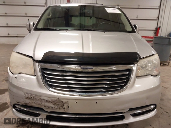 2011 Chrysler Town & Country Touring z VIN 2A4RR5DGXBR723116, wystawiony jako IAAI lot #42156888 z przebiegiem 177 591 mil mil oraz . Historia ofert i sprzedaży dostępna na DreamBid. Obrazek 13.
