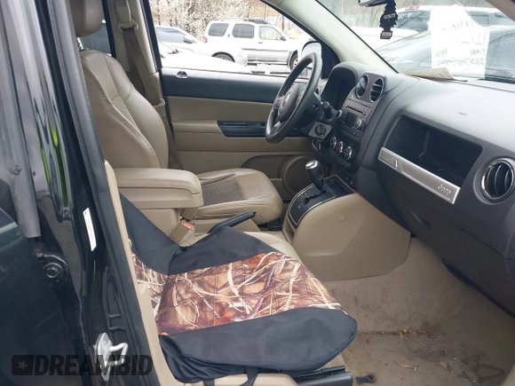2014 Jeep Compass Sport with VIN 1C4NJCBA9ED823228, listed as a IAAI auction lot 41714992 with 168,996 mi miles. Bid and sale history available at carsss.com. Image 5.