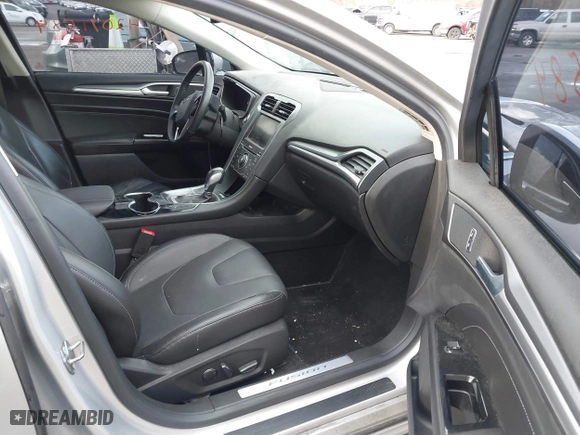 2015 Ford Fusion Titanium Hybrid with VIN 3FA6P0RU8FR181312, listed as a IAAI auction lot 42071584 with 99,955 mi miles. Bid and sale history available at carsss.com. Image 5.
