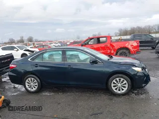 2015 Toyota Camry XLE with VIN 4T1BF1FK4FU043212, listed as a IAAI auction lot 41706573 with 170,074 mi miles and . Bid and sale history available at DreamBid. Image 13.