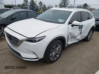 2021 Mazda CX-9 Signature with VIN JM3TCBEY7M0516772, listed as a IAAI auction lot 41553396 with 36,749 mi miles. Bid and sale history available at carsss.com. Image 2.