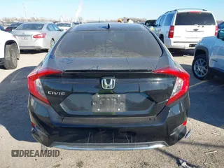 2021 Honda Civic Sedan EX-L with VIN 19XFC1F7XME013492, listed as a IAAI auction lot 41301223 with 57,873 mi miles. Bid and sale history available at carsss.com. Image 16.