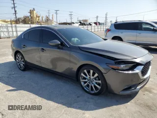 2021 Mazda 3 Premium with VIN JM1BPADL7M1342365, listed as a Copart auction lot 58619075 with 40,556 mi miles and Salvage title. Bid and sale history available at DreamBid. Image 4.