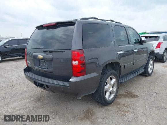 2011 Chevrolet Tahoe LT with VIN 1GNSCBE09BR284481, listed as a IAAI auction lot 42051462 with 194,670 mi miles and . Bid and sale history available at DreamBid. Image 4.