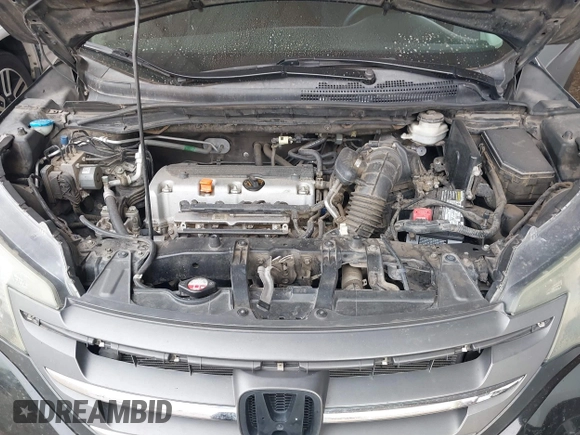2013 Honda CR-V LX with VIN 2HKRM3H36DH511653, listed as a IAAI auction lot 39041262 with 90,336 mi miles and . Bid and sale history available at DreamBid. Image 10.