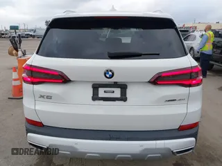 2021 BMW X5 xDrive40i with VIN 5UXCR6C03M9G36156, listed as a IAAI auction lot 42125009 with 30,877 mi miles. Bid and sale history available at carsss.com. Image 16.