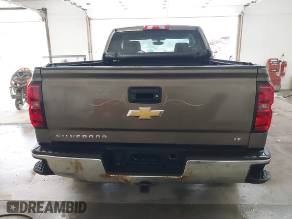 2014 Chevrolet Silverado 1500 LT with VIN 1GCVKREC5EZ147506, listed as a IAAI auction lot 41736960 with 112,399 mi miles and . Bid and sale history available at DreamBid. Image 17.