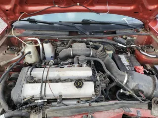 1999 Ford Escort Cool z VIN 3FAKP1135XR110190, wystawiony jako Copart lot #83667154 z przebiegiem 82 448 mil mil oraz Szkoda całkowita • Salvage title. Historia ofert i sprzedaży dostępna na DreamBid. Obrazek 13.