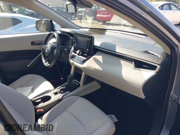 2022 Toyota Corolla Cross L with VIN 7MUAAABGXNV035110, listed as a IAAI auction lot 42562359 with 17,106 mi miles and . Bid and sale history available at DreamBid. Image 5.