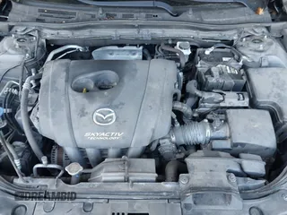 2018 Mazda 3 Touring with VIN 3MZBN1L35JM229453, listed as a IAAI auction lot 42123176 with 113,051 mi miles and . Bid and sale history available at DreamBid. Image 10.
