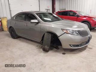 2015 Lincoln MKS with VIN 1LNHL9EK8FG608496, listed as a IAAI auction lot 42347566 with 83,946 mi miles and . Bid and sale history available at DreamBid. Image 1.