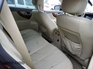 2015 Infiniti QX70 z VIN JN8CS1MW3FM480682, wystawiony jako Copart lot #44466285 z przebiegiem Nie podano mil oraz Szkoda całkowita • Salvage title. Historia ofert i sprzedaży dostępna na DreamBid. Obrazek 11.