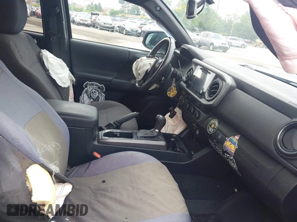 2017 Toyota Tacoma SR5 with VIN 3TMCZ5ANXHM089093, listed as a IAAI auction lot 42513711 with 86,022 mi miles and . Bid and sale history available at DreamBid. Image 5.