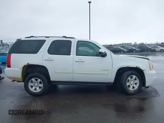 2011 GMC Yukon SLT with VIN 1GKS2CE03BR118690, listed as a IAAI auction lot 41941840 with 243,311 mi miles and . Bid and sale history available at DreamBid. Image 13.